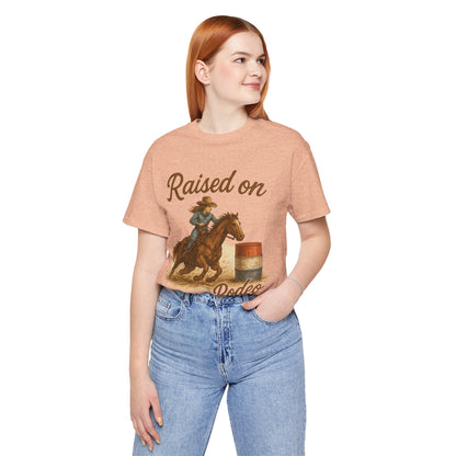 Raised on Rodeo Barrel Racing Tee – Western Cowgirl Graphic Shirt