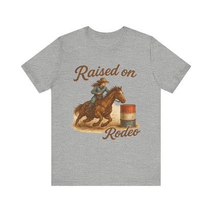 Raised on Rodeo Barrel Racing Tee – Western Cowgirl Graphic Shirt