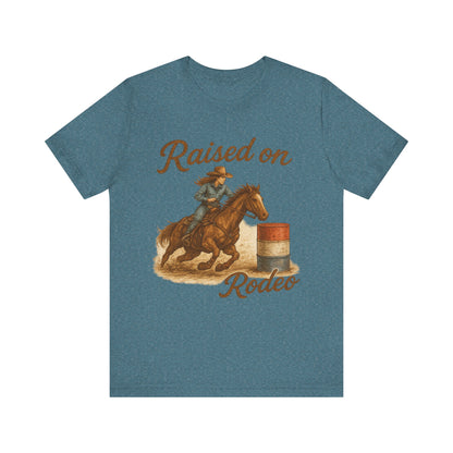 Raised on Rodeo Barrel Racing Tee – Western Cowgirl Graphic Shirt