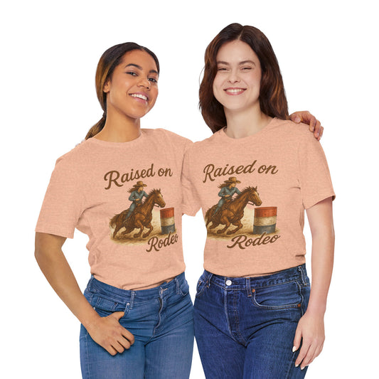 Raised on Rodeo Barrel Racing Tee – Western Cowgirl Graphic Shirt